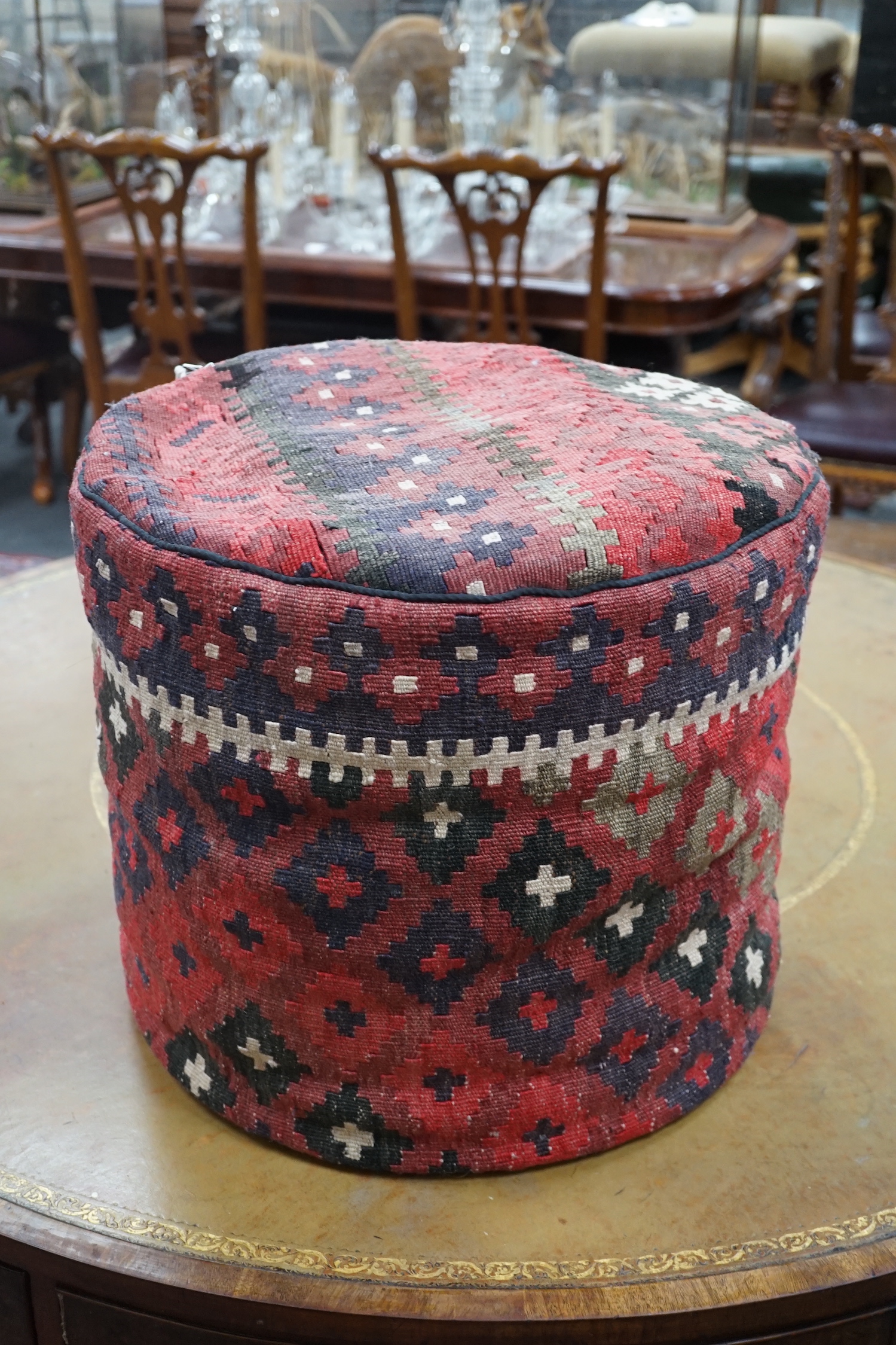 A circular kilim pouffe, diameter 45cm, height 40cm
